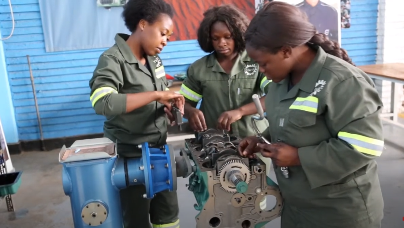 Young women training engineering