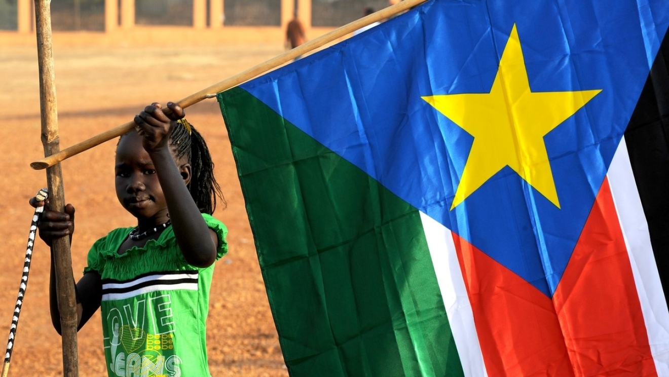 girl with South Sudan flag
